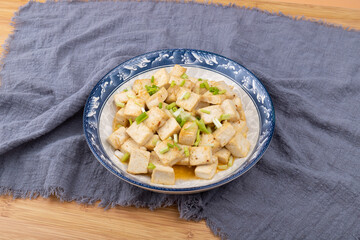 The home-cooked dish stir-fried tofu on the plate