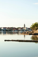 Obraz premium Coastal Town Reflection