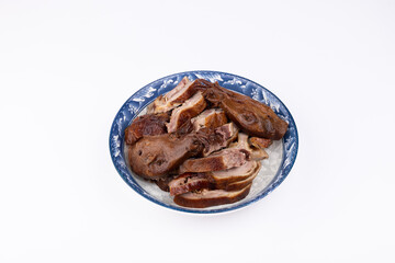 The marinated duck meat on the plate