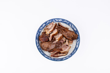 The marinated duck meat on the plate