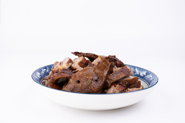 The marinated duck meat on the plate