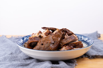 The marinated duck meat on the plate