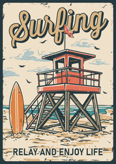 Surfing by the lifeguard tower