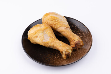 The fragrant marinated chicken legs on the plate
