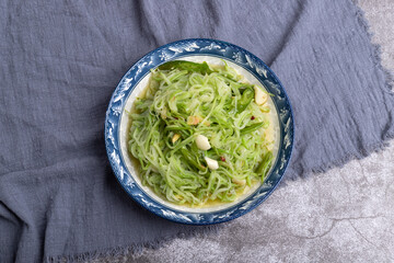The stir-fried shredded Buddha's hand gourd on the plate
