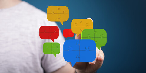 Abstract image of puzzle pieces forming speech bubbles.  Ideal for communication, teamwork, and...
