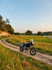Off-road motorcycle adventure scenic riverbank photograph natural landscape wide angle freedom and exploration