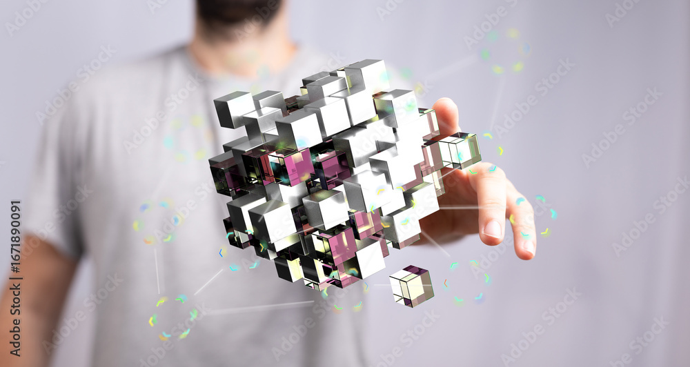 Poster abstract image of a man interacting with a digital 3d model of interconnected data cubes. perfect fo