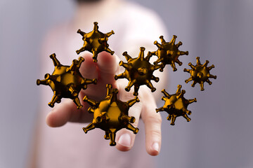 Close-up of a hand interacting with 3D golden virus models.  Perfect for medical, science, or...