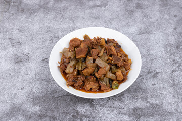 The pickled cabbage and konjac braised duck on the plate