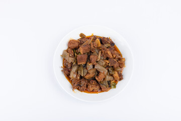 The pickled cabbage and konjac braised duck on the plate