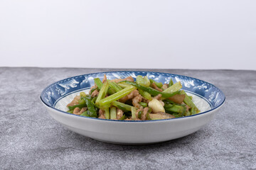 Stir-fried pork with celery on the plate