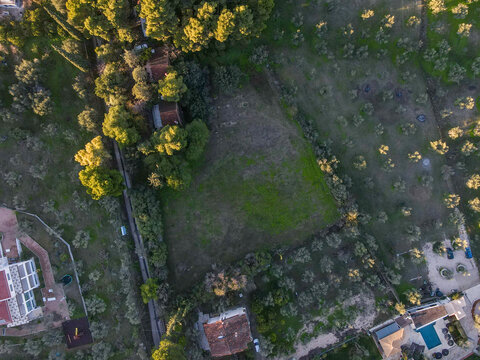 Aerial top down of rocky grassy meadow near Nafplio winter in Mediterranean Greece