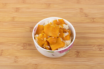 Pumpkin rice in a porcelain bowl