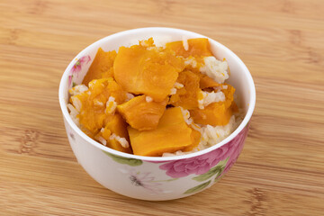 Pumpkin rice in a porcelain bowl