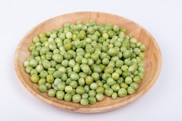 Raw peas on the plate