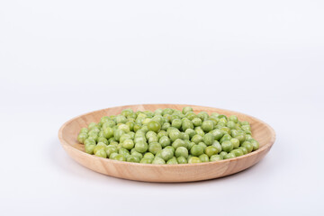 Raw peas on the plate