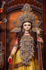 Obraz premium Subho mahalaya, An handmade idol of Goddess Durga decorated in colorful Pandal. Durga Puja is biggest religious festival of Hinduism and for bengalis and is now celebrated worldwide.