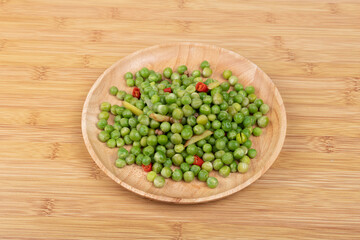 The boiled peas on the plate