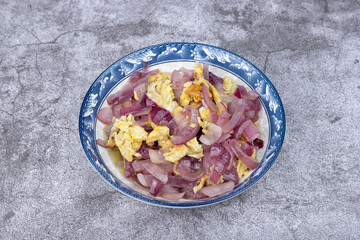 Onion and egg stir-fry on the plate
