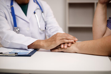 overweight Asian woman consults with a health expert in a private office, discussing wellness, lifestyle changes, and medical advice. The scene reflects guidance, support