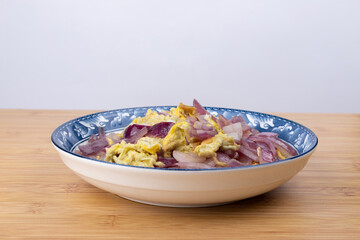 Onion and egg stir-fry on the plate