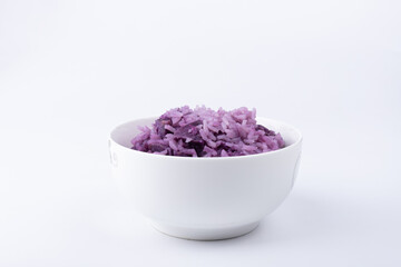 Purple sweet potato rice in a small bowl