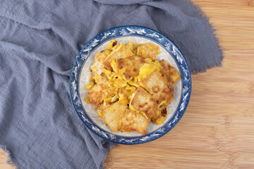 The fried tofu with eggs on the plate