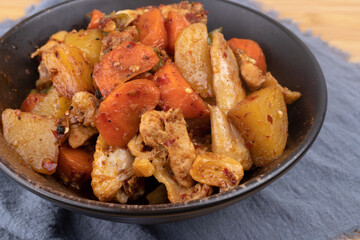 Chicken braised with carrots and potatoes