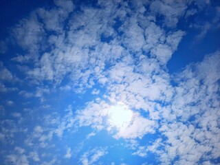 Clouds and clear blue sky background