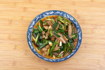 Garlic sprout braised pork