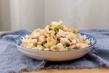 The stir-fried diced lotus root on the plate