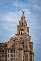 Liverpool city skyline, waterfront featuring The Royal Liver Building, on the River Mersey, England. 6th August 2025