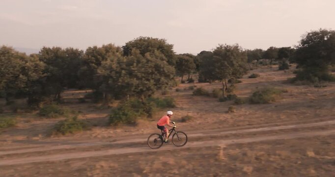 Drone View of Mountain Bike Rider Fast Cycling in Nature Adventure