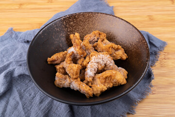Fresh crispy meat frozen in a porcelain bowl