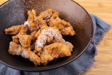 Fresh crispy meat frozen in a porcelain bowl