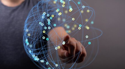 Person interacts with a digital global network, representing connection and data flow.