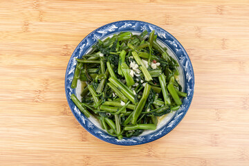 Garlic-mashed water spinach on the plate