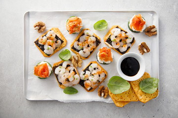 Assorted appetizers with shrimps and salmon