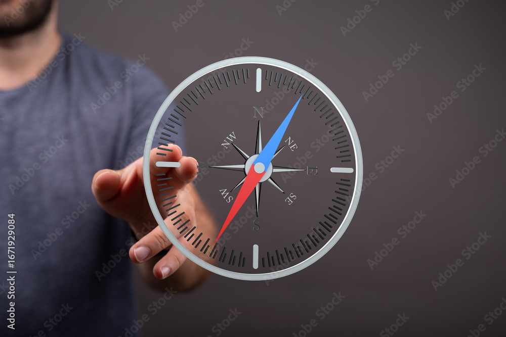 Poster find your path with this image of a person using a digital compass. perfect for business, navigation