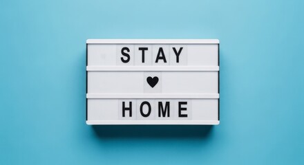 White lightbox with 'Stay Home' message on blue background.