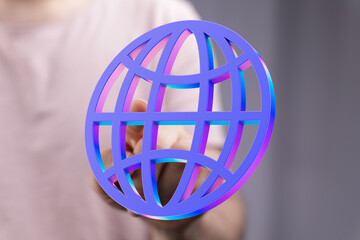 Person's hand holding a vibrant 3D globe icon, symbolizing global network and connection.
