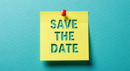 Yellow sticky note pinned to a blue wall, reading 'Save The Date'.