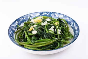 The stir-fried sweet potato leaves on the plate