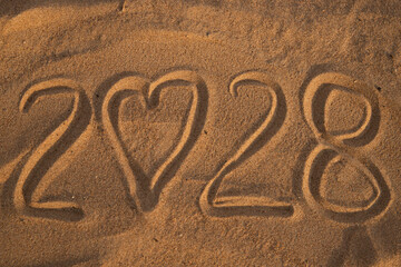2028 Drawn on Sand in Summer, new year numbers