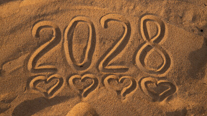 2028 Drawn on Sand in Summer, new year numbers