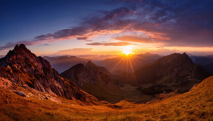 Fototapeta premium a photography of majestic mountain sunrise a majestic sunrise over a mountain range with the first rays of light painting the peaks in shades of gold and pink exudes the exuberance of sunrise beau