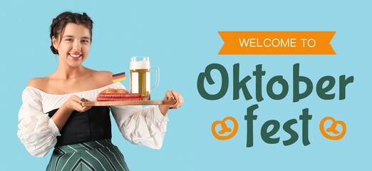 Young waitress with beer and traditional German food on blue background. Octoberfest celebration
