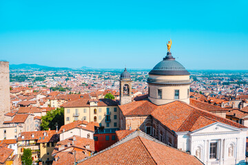 the cathedral dome over rooftops in Bergamo