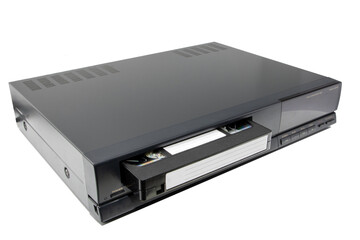 Close-up of a video cassette recorder player, isolated on white background